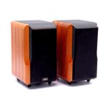 2 Chario Constellation speakers in walnut cabinet