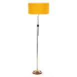 chrome-plated metal floor lamp