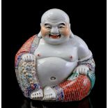 Porcelain statue of a seated Buddha