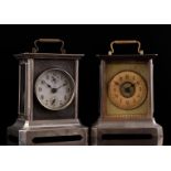 2 old travel alarm clocks