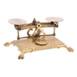 Antique balance with 4 weights