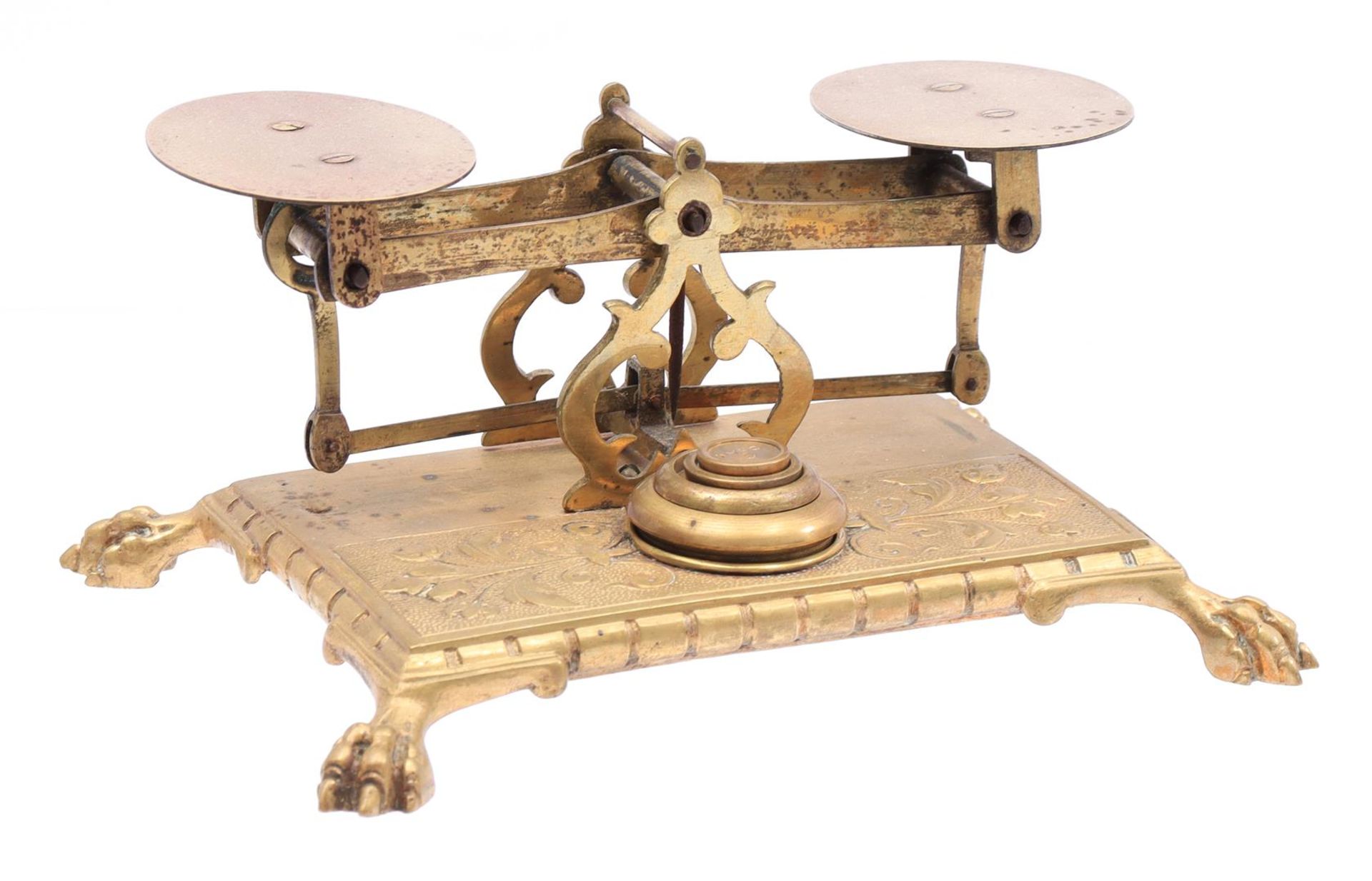 Antique balance with 4 weights