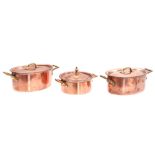 3 red copper lidded pans