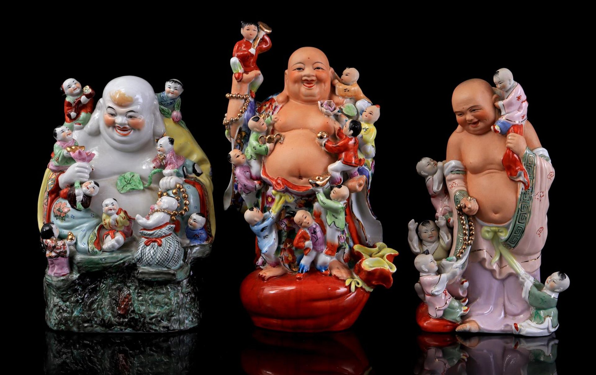 3 porcelain happy Buddha statues