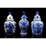 3 Porceleyne Fles lidded vases with blue flower decor
