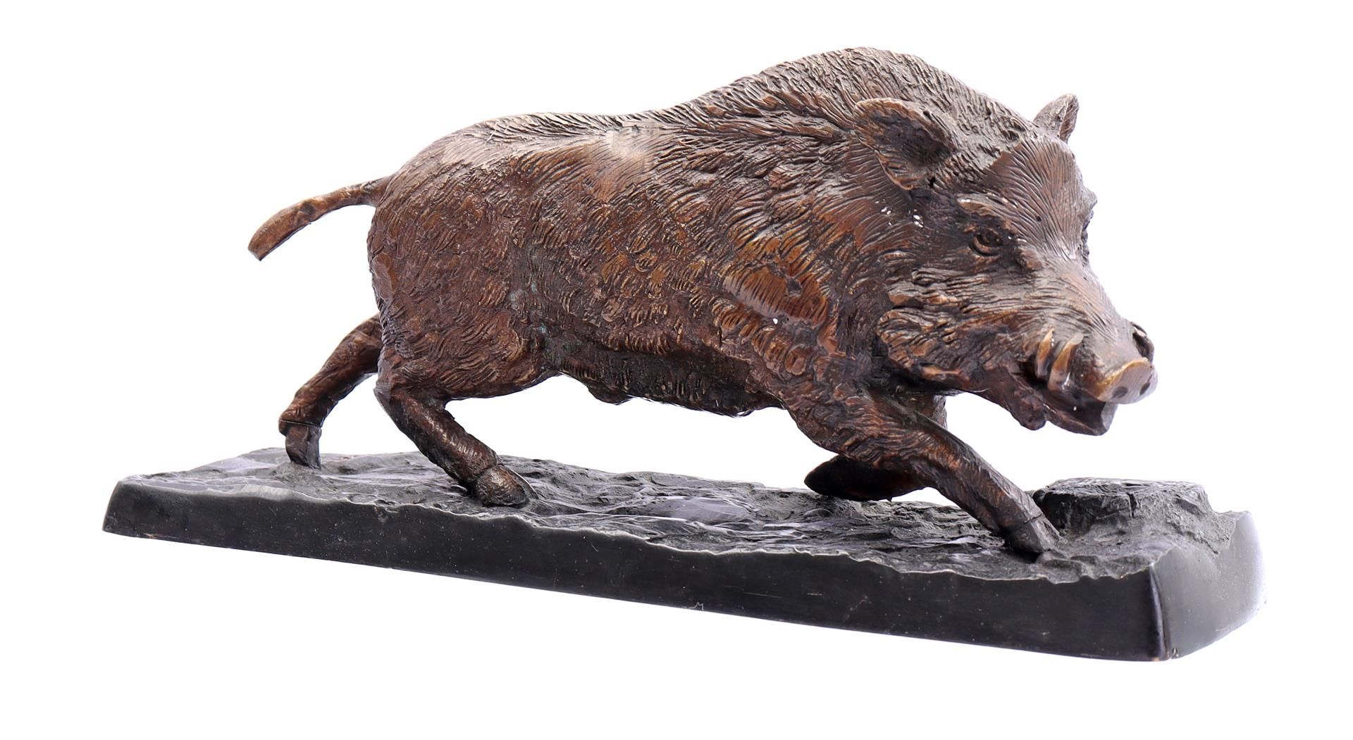 Bbronze sculpture of a wild boar