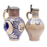 2 vitrified clay jugs