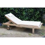 Adjustable and mobile teak lounger