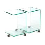 2 glass mobile tables