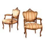 2 gold-coloured walnut armchairs