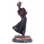 Bronze sculpture of a golf star