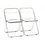 2 plastic folding chairs