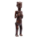 Wooden fertility statue