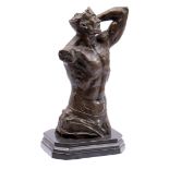 Bronze sculpture of a male torso