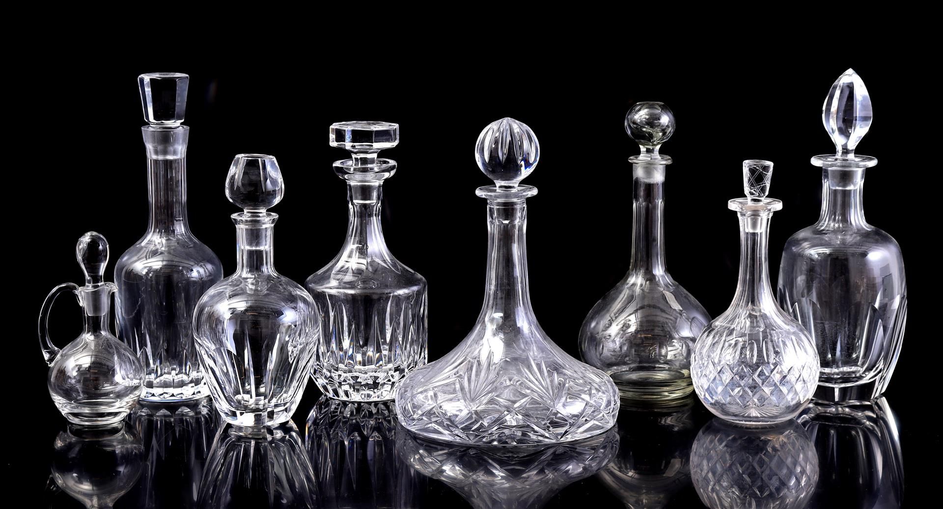 8 various glass and crystal carafes