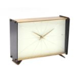 Table clock in brass case