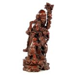 Richly carved oriental statue