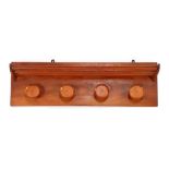 Walnut-colored spruce wall coat rack