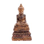 Antique wooden sitting Buddha
