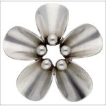 A Danish silver brooch by N E From, composed of five concave petals, with central bead accents,