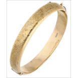 A 9ct gold bangle, the hinged bangle with engraved floral decoration, to a v-snap clasp with trace-