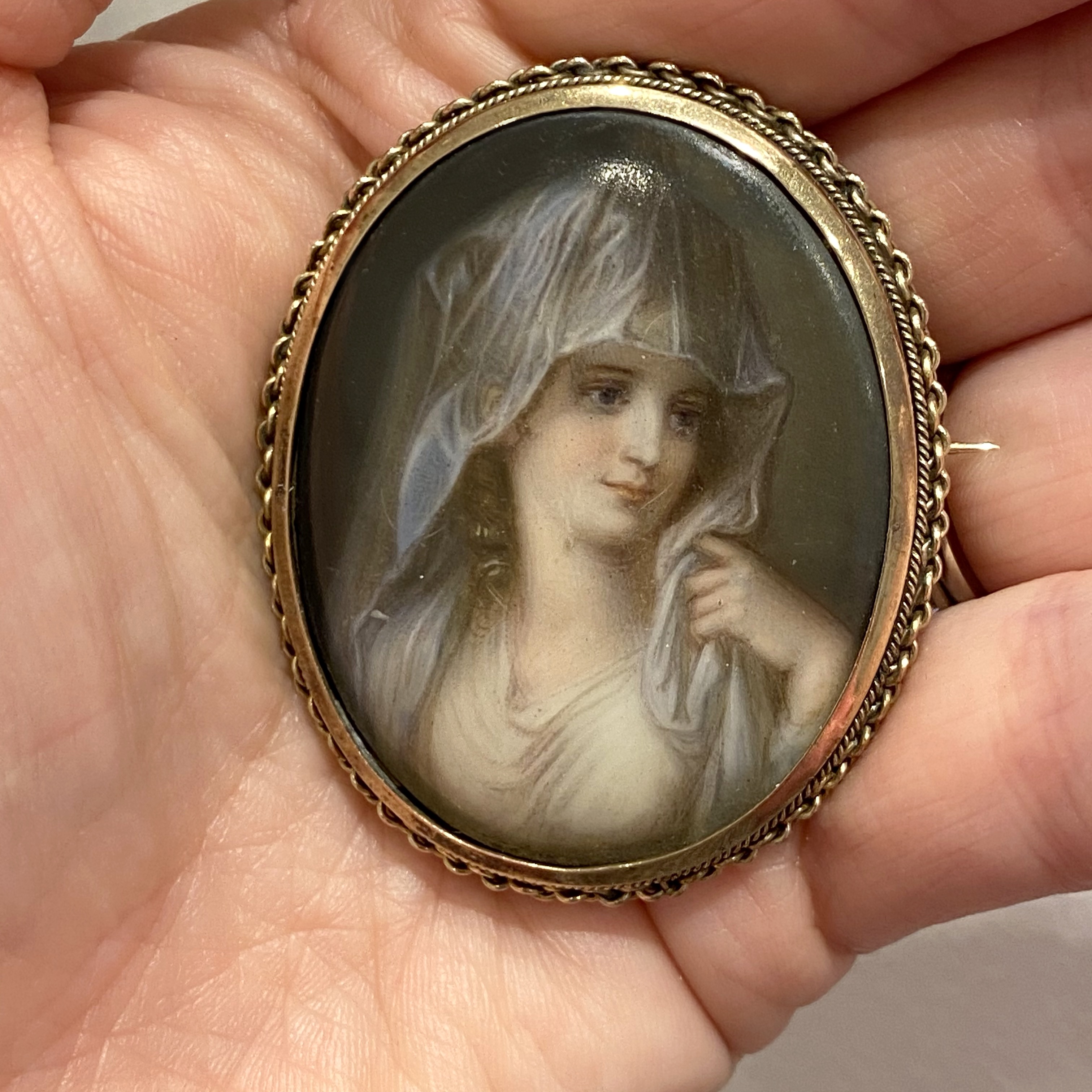 A Victorian oval enamelled brooch, set with an enamelled representation of the Portrait of a Lady as - Image 3 of 3