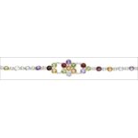 A silver gem-set bracelet, composed of vari-coloured stones including garnet, citrine, peridot,