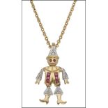 A gem-set novelty pendant on chain, the articulated pierrot with ruby and diamond highlights,