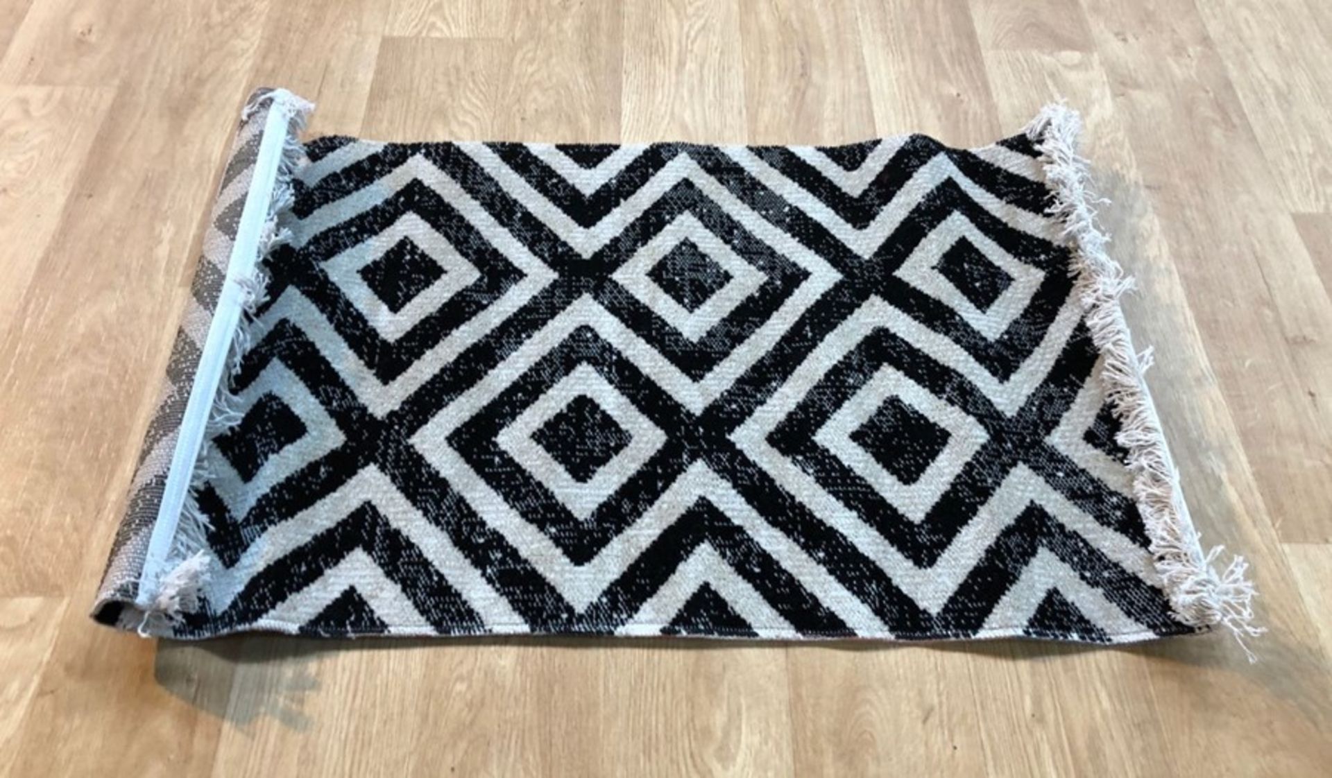 MIDDLEHAM FLATWEAVE BLACK INDOOR/OUTDOOR RUG / SIZE: 60 X 100CM BY WORLD MENAGERIE