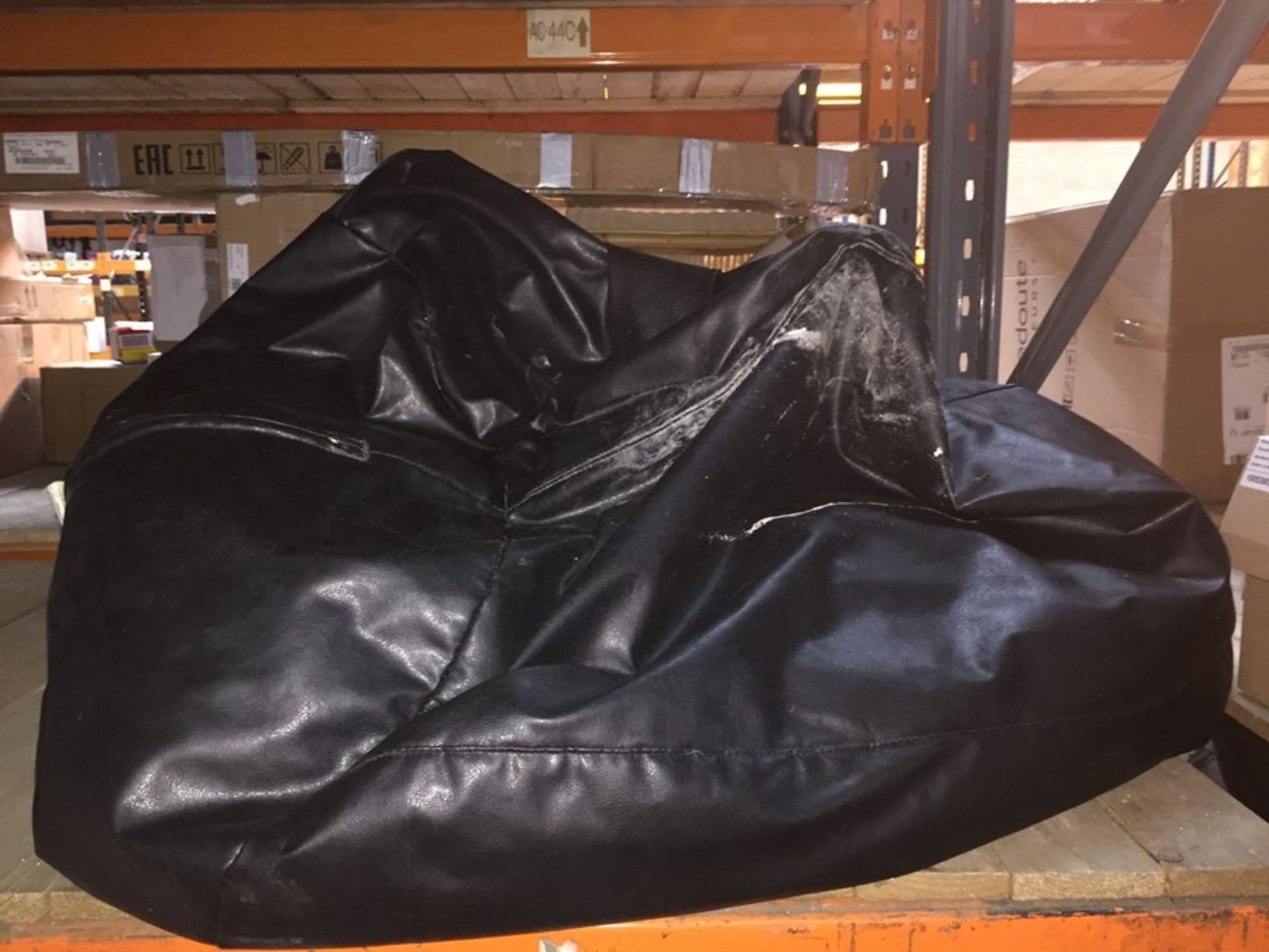 1 LOT TO CONTAIN A LEATHER BEAN BAG, SOME MARKS WHICH CAN BE CLEANED OFF