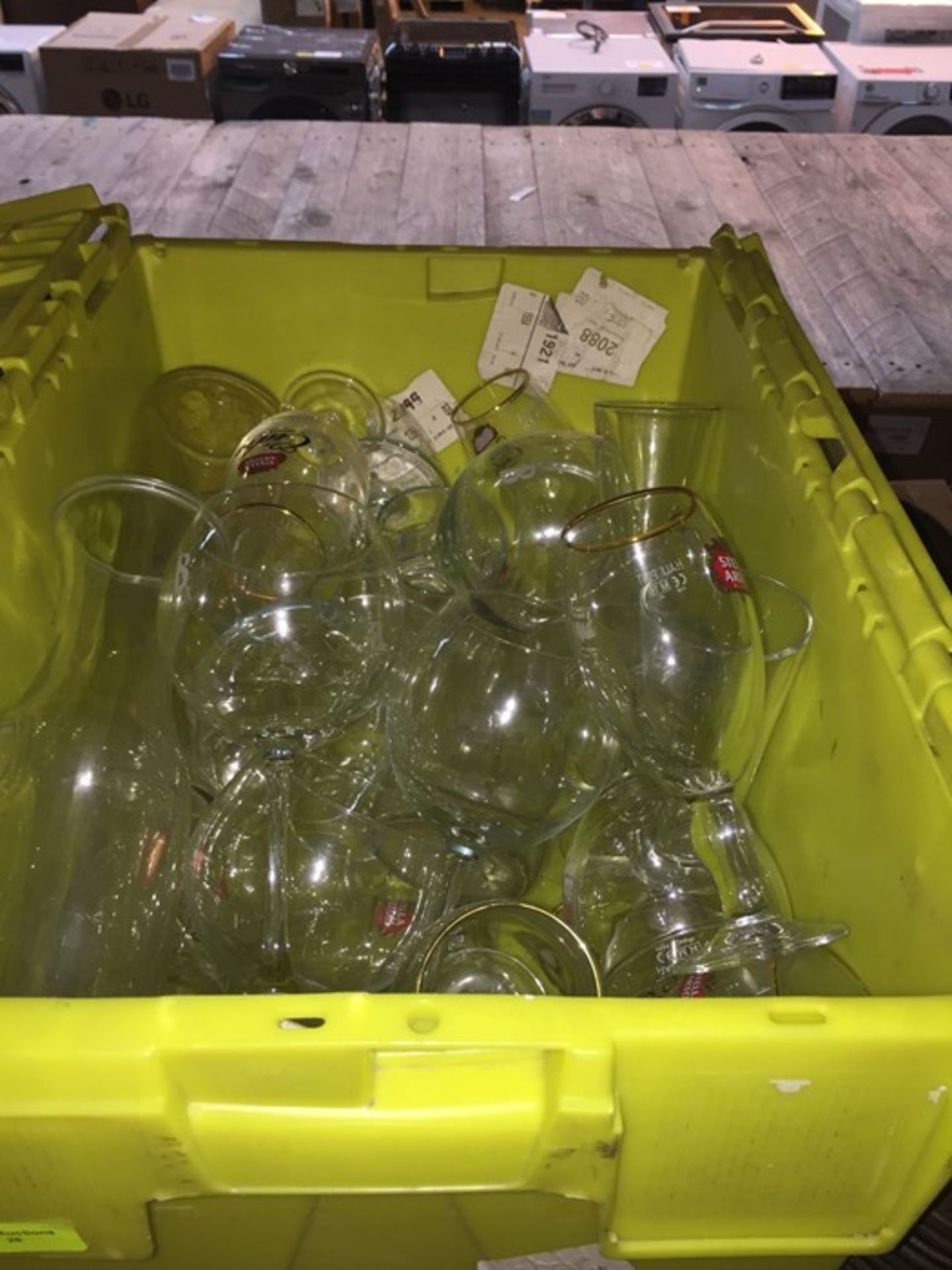 1 LOT TO CONTAIN A TOTE FULL WITH AN ASSORTMENT OF GLASSES IN VARIOUS STYLES AND SIZES