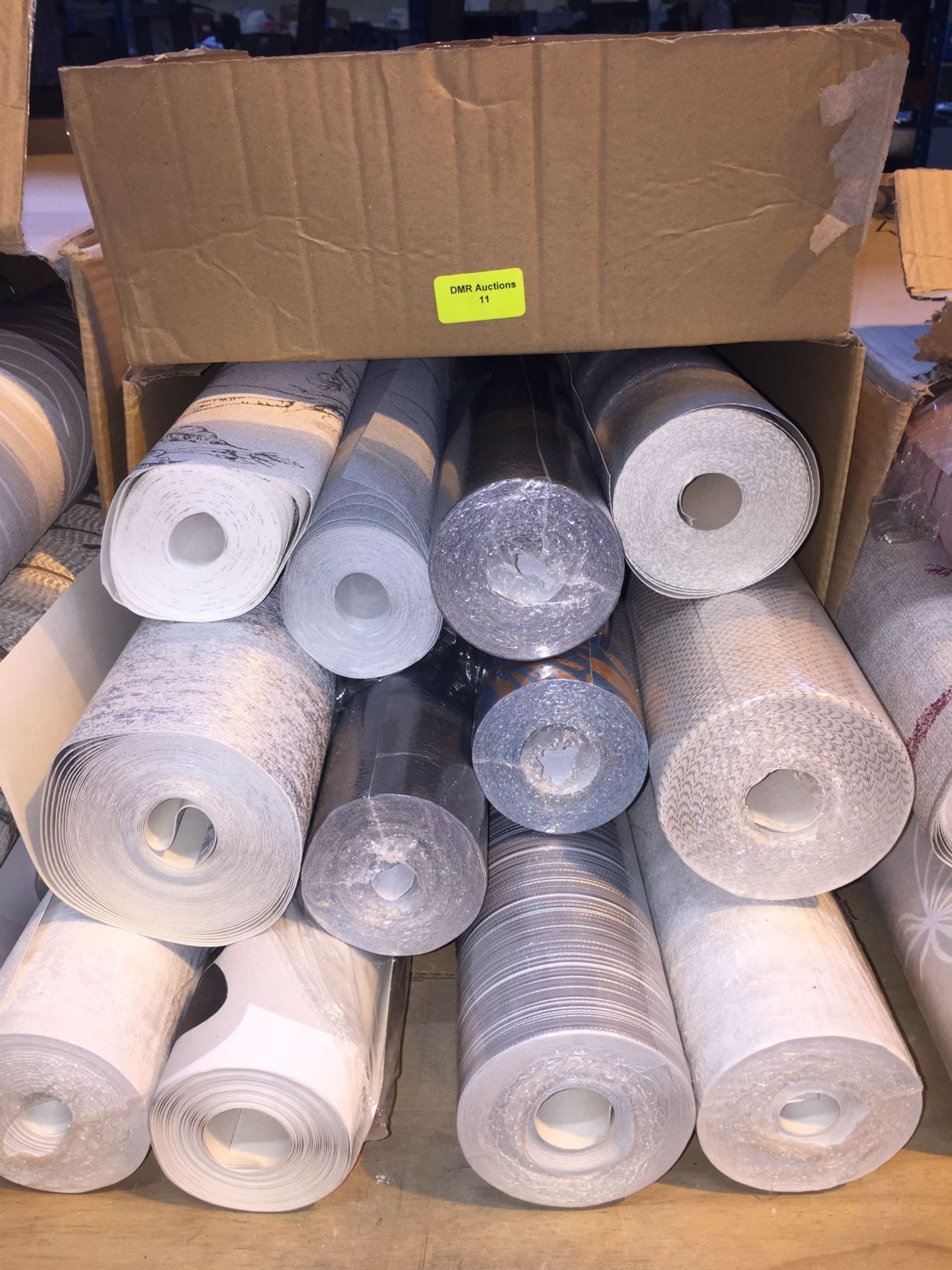 1 LOT TO CONTAIN A BOX OF ASSORTED WALLPAPER, THERE ARE 12 ROLLS IN THIS LOT, CONDITIONS VARY