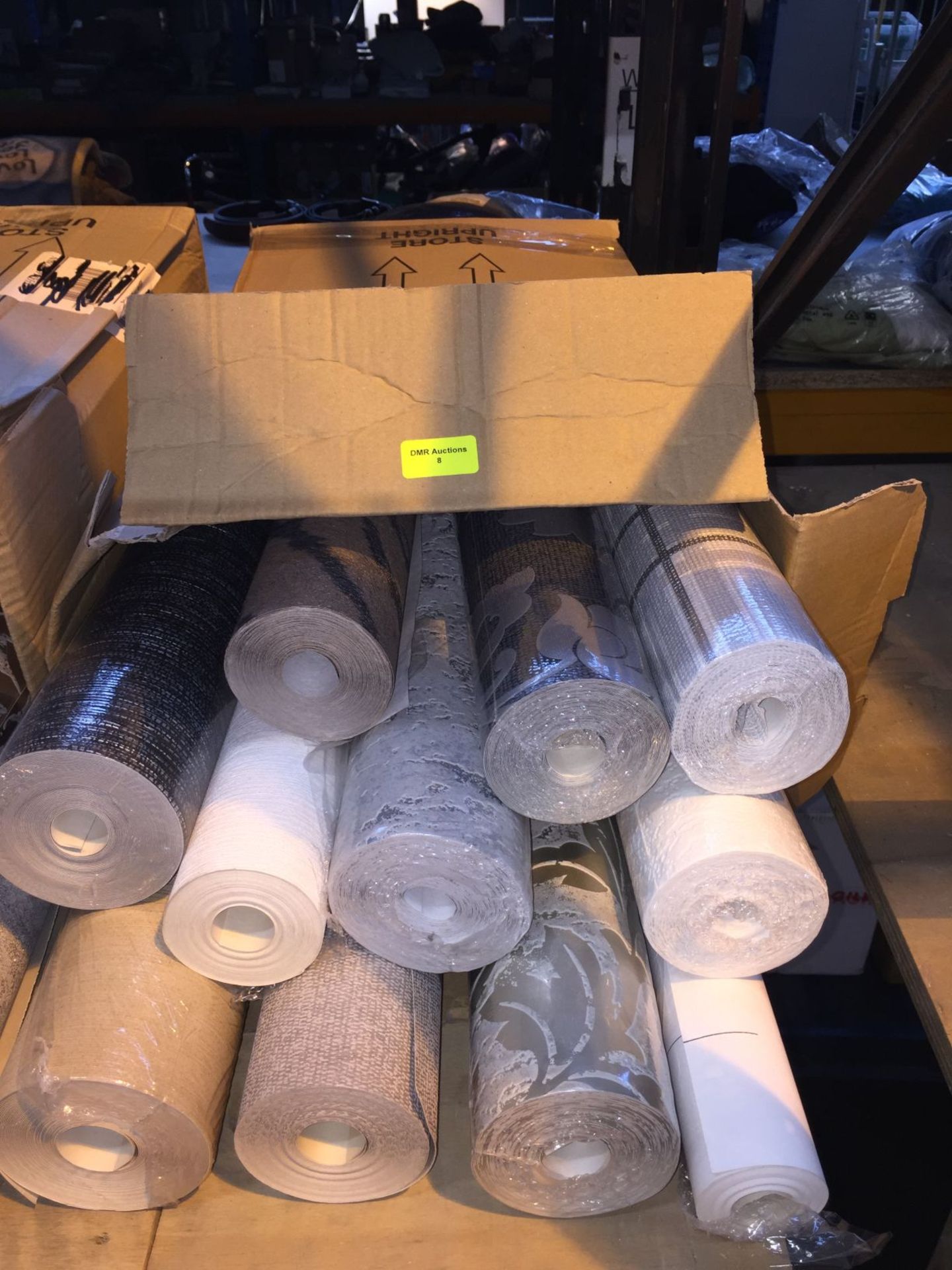 1 LOT TO CONTAIN A BOX OF ASSORTED WALLPAPER, THERE ARE 11 ROLLS IN THIS LOT, CONDITIONS VARY