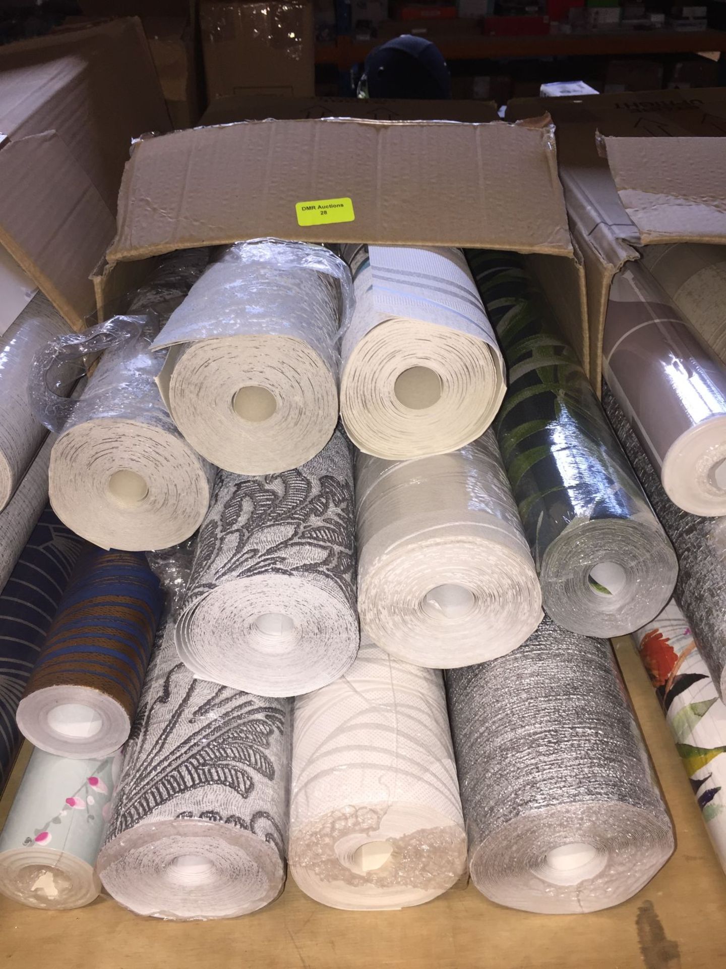 1 LOT TO CONTAIN A BOX OF ASSORTED WALLPAPER, THERE ARE 11 ROLLS IN THIS LOT, CONDITIONS VARY