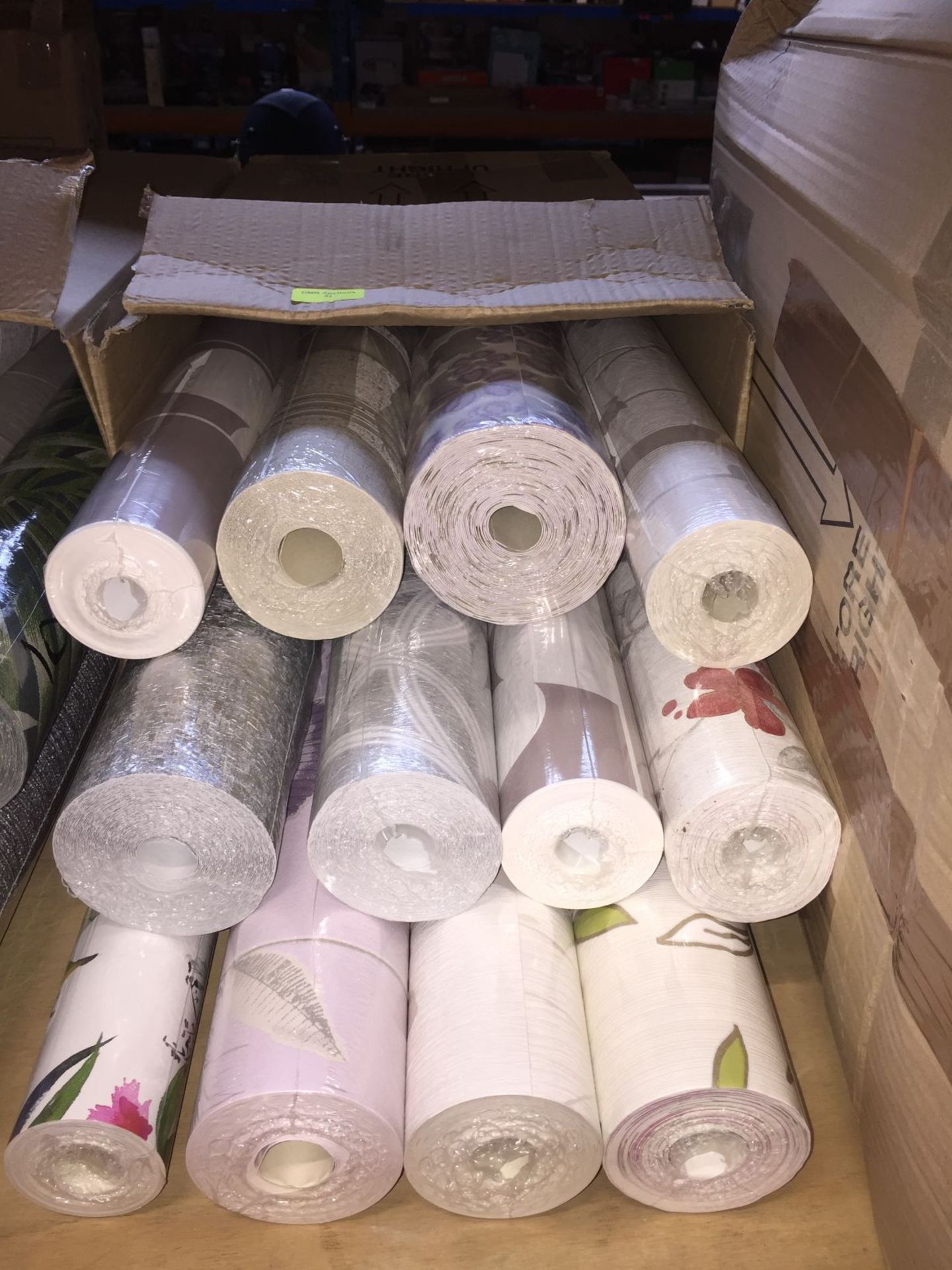 1 LOT TO CONTAIN A BOX OF ASSORTED WALLPAPER, THERE ARE 12 ROLLS IN THIS LOT, CONDITIONS VARY