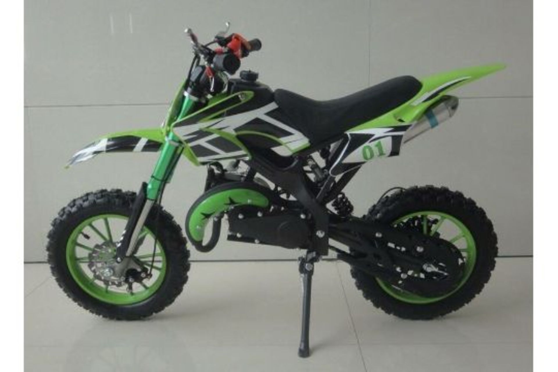 1 LOT TO CONTAIN AN AS NEW BOXED FALCON KIDS 49CC MINI DIRT BIKE IN GREEN