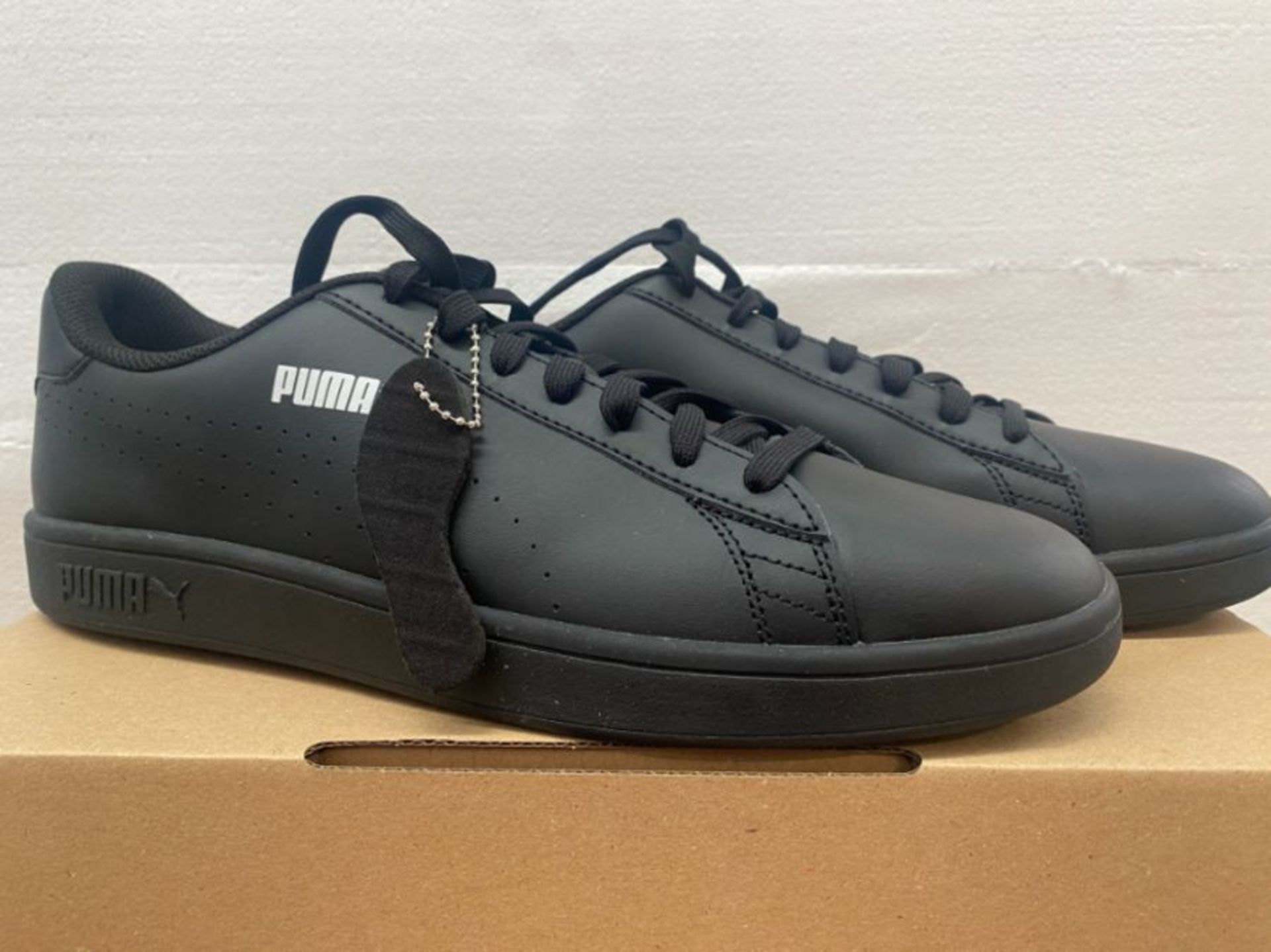 1 LOT TO CONTAIN AN AS NEW BOXED PAIR OF PUMA UK SIZE 12 TRAINER IN BLACK