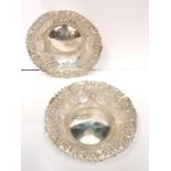 Pair of silver pierced and chased circular Bon Bon dishes, quatrefoil piercing with a foliate chased