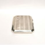 An engine turned art deco Birmingham silver cigarette case dated 1923. 9 cm by 8 cm approx. 113
