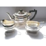 Three piece silver oval tea set with scalloped edge. Edinburgh 1933, makers Hamilton & Inches. 35