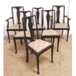 A set of four and two Georgian dining chairs having a splat back over slip in seat. Raised on turned