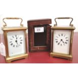 A 19th century French brass carriage clock complete with red leather travel case together with