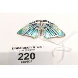 A vintage silver and enamel moth brooch stamped 925.