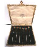 Cased set of silver and finely enamelled cocktail sticks with an enamelled cock at the head,