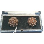14 K American diamond cluster earrings set in gold with enamel circa 1960. Diamonds 2 cts approx
