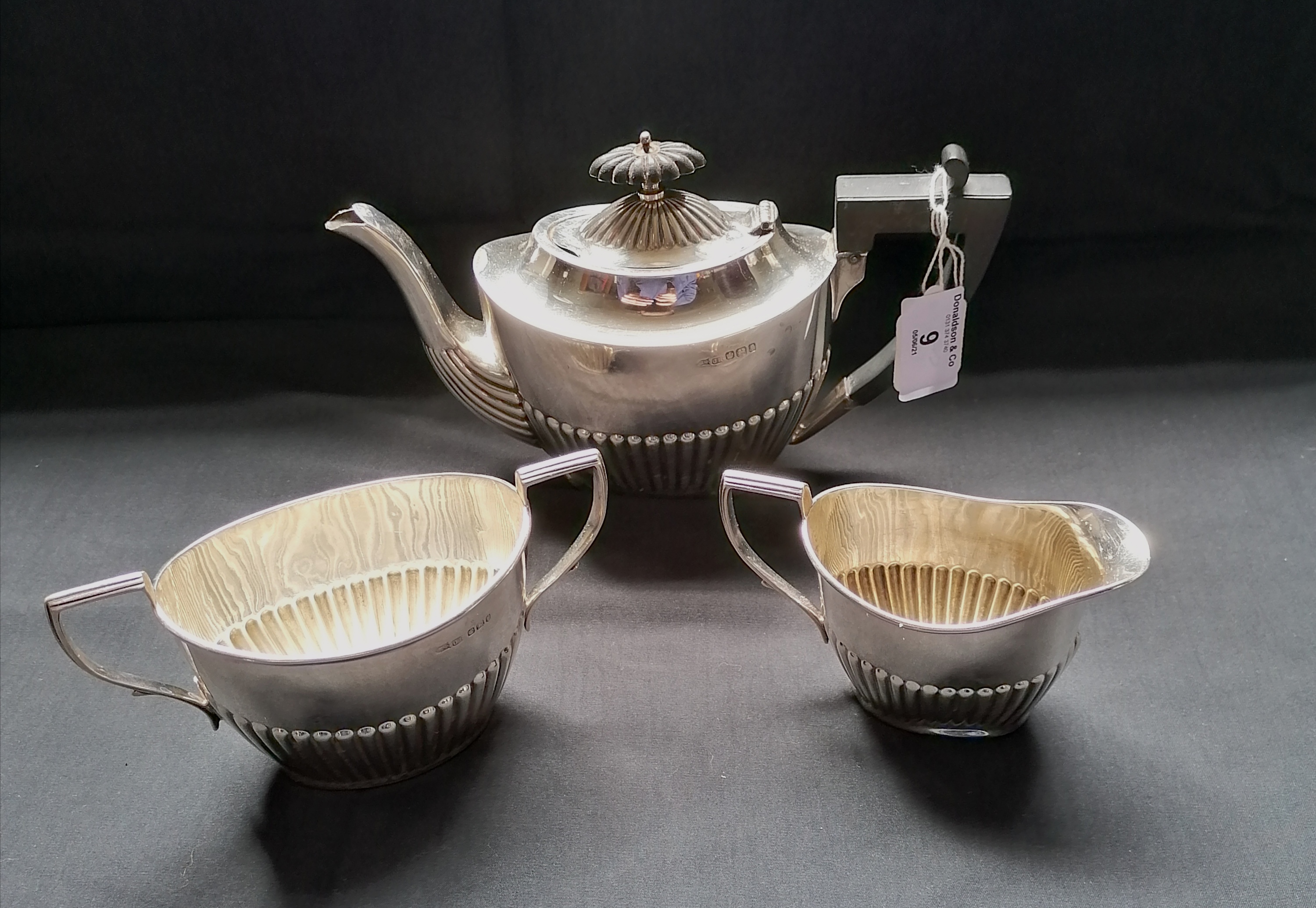 Three piece Victorian silver half lobed batchelor's tea set. Sheffield 1898, makers Joseph Rodgers &