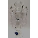 A Villeroy Bosh crystal candlestick complete with drops. 22 cm height, 11 cm width approx.