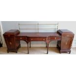 A 19th century inlaid mahogany break front sideboard in the manor of Hepplewhite, having a gallery