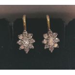 Pair of 18 ct (tested) diamonds earrings, marquise centre stone, 0.90 cts approx.