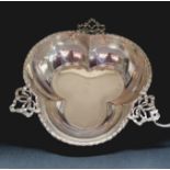 Silver trefoil hors d~oeuvres bon-bon dish with pierced dimpled handles and fancy gadroon edge,